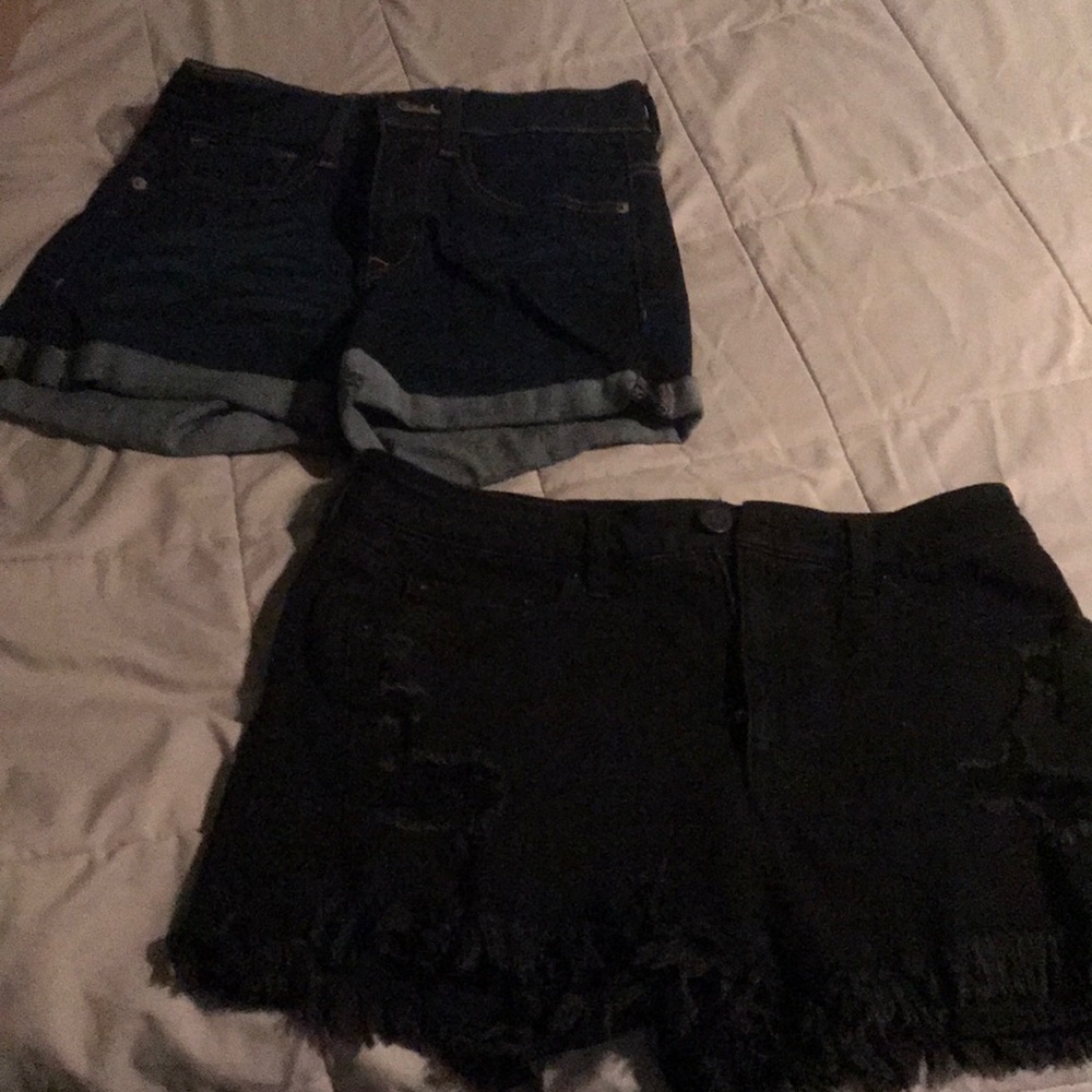 2 pairs of high waisted jean shorts.